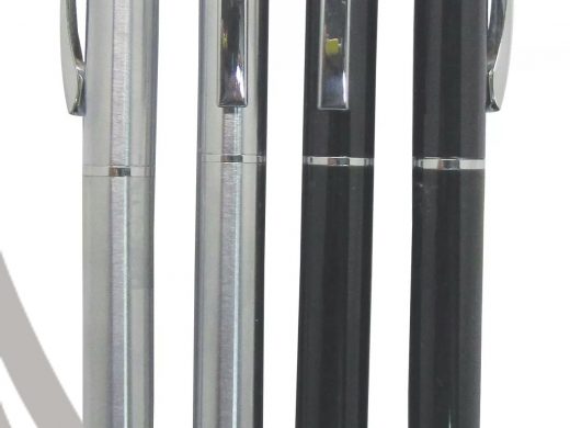 Four modern silver and black corporate pens by HELLEN'S GROUP.