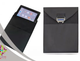 Professional dark tablet sleeve by CASIO, shown open and closed.
