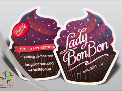 Cupcake-shaped business cards for Lady BonBon featuring purple frosting and 'Bite Me' tag.