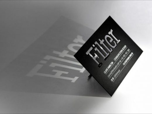 Sleek, square black business card design featuring 'Filter' logo and die-cut effect.