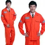 East Asian model wearing bright orange industrial safety uniform with reflective strips.