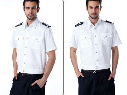 Two male security officers modeling white short-sleeve uniform shirts with dark epaulets.