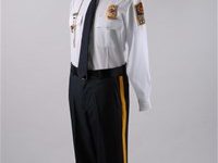 Professional security guard uniform with gold stripe trousers on a mannequin.