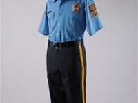 Light blue security guard uniform with navy trousers and gold stripe.